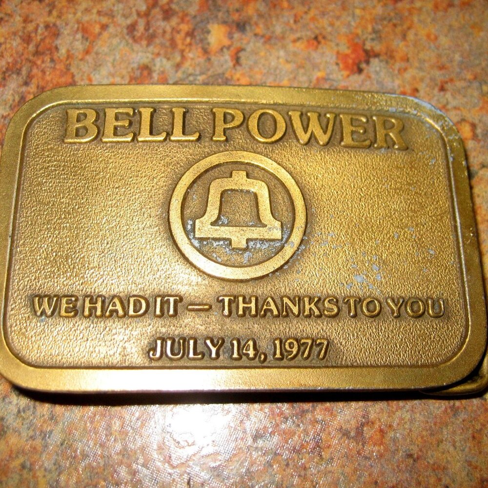 VINTAGE HIT LINE USA BRASS 1977 BELL POWER BELT BUCKLE